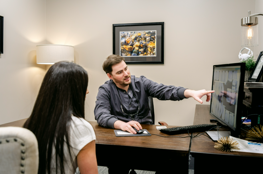 Cosmetic dentist reviewing personalized cosmetic dentistry treatment options with a patient from Cape Elizabeth, ME.